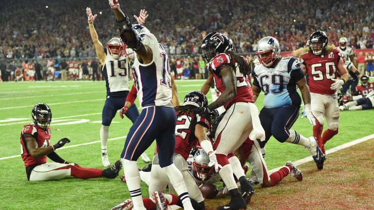 James White #28 of the New England Patriots scores the game winning touchdown in overtime against the Atlanta Falcons during Super Bowl 51 at NRG Stadium o