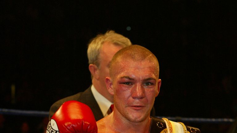 Jamie Moore of England celebrates his victory against Adam Katumwa of Uganda in 2004