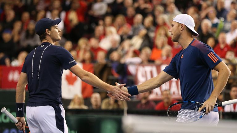 OTTAWA, ON - FEBRUARY 4: Jamie Murray and Dominic Inglot of Great Britain shake hands during the doubles match on day two of the Davis Cup World Group tie 
