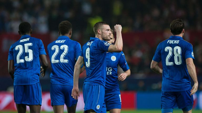 Leicester City's forward Jamie Vardy (C) celebrates after scoring during the UEFA Champions League round of 16 second leg football match Sevilla FC vs Leic