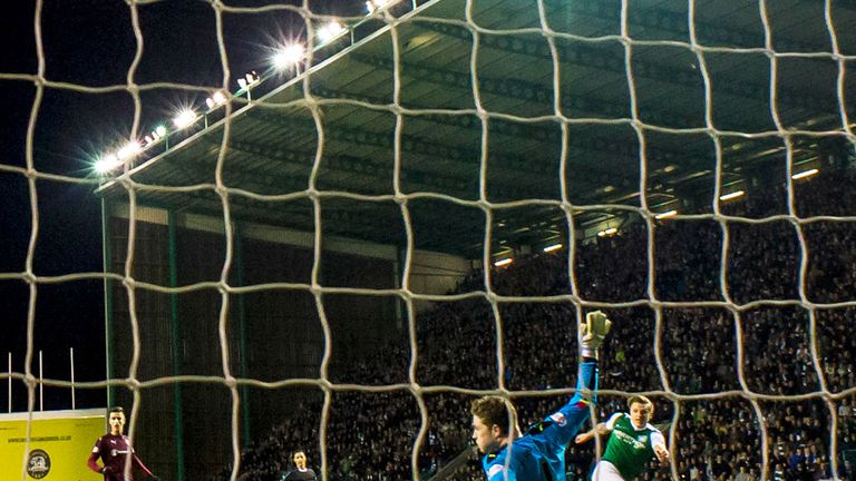 Jason Cummings scores Hibernian's first goal in the 3-1 win over Hearts
