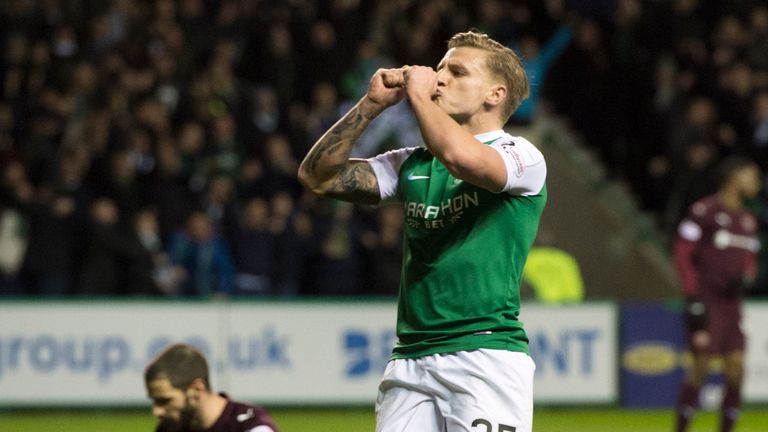 Jason Cummings celebrates after putting Hibs into the lead