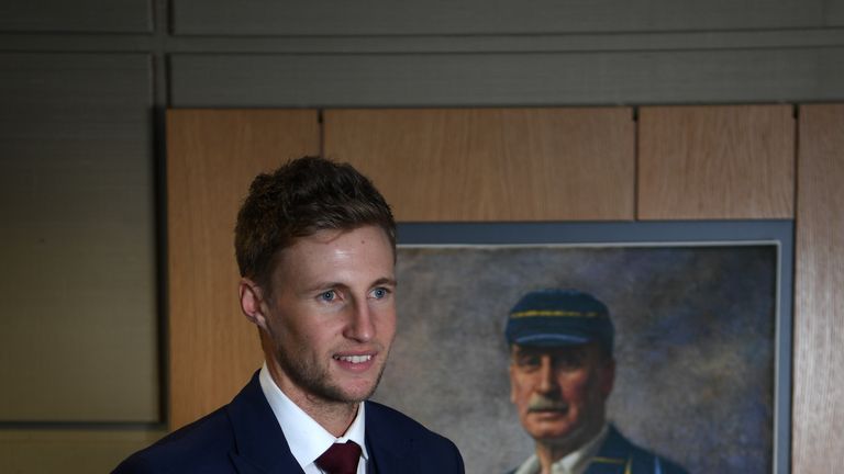 LEEDS, ENGLAND - FEBRUARY 15:  Joe Root of England poses for a portrait infront of a picture of Ex England Cricketer, Lord Hawke during a Joe Root Press Co