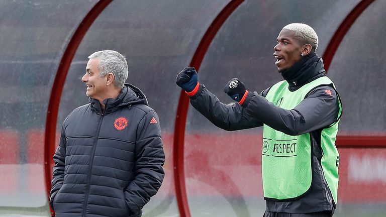 Jose Mourinho and Paul Pogba appear in good spirits during a training session at the Aon Training Complex