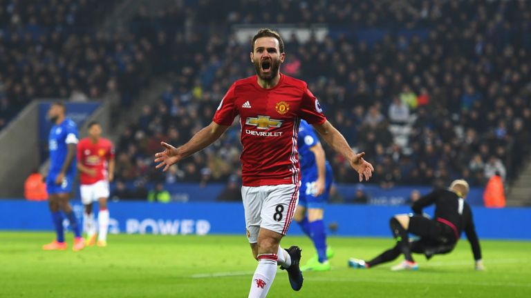 Juan Mata celebrates scoring Manchester United's third goal