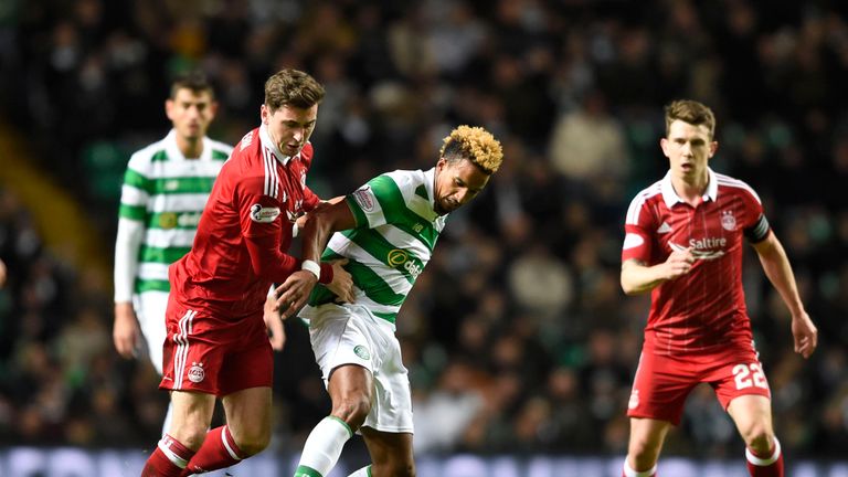 Kenny McLean puts Scott Sinclair under pressure