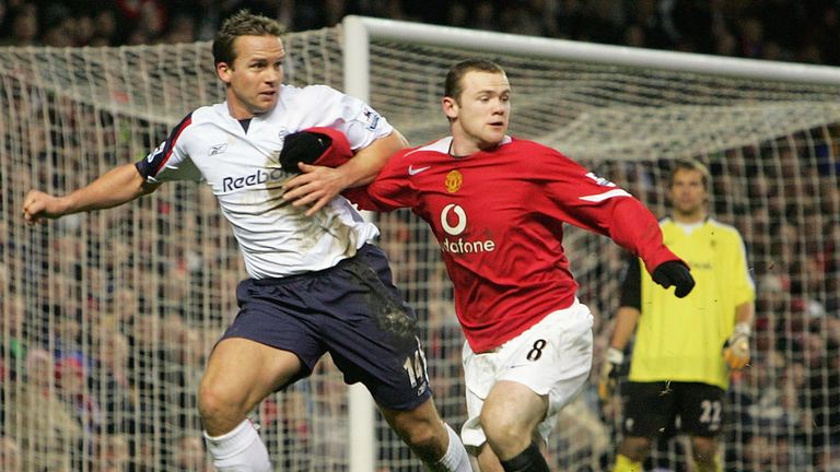 Bolton's Keving Davies and Wayne Rooney of Manchester United in 2005