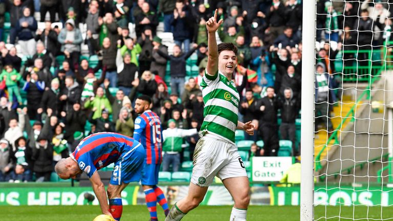 Celtic left-back Kieran Tierney celebrates scoring a rare goal for the team