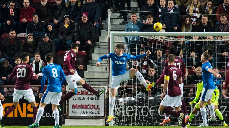 Hearts' Krystian Nowak heads the opener for the home side