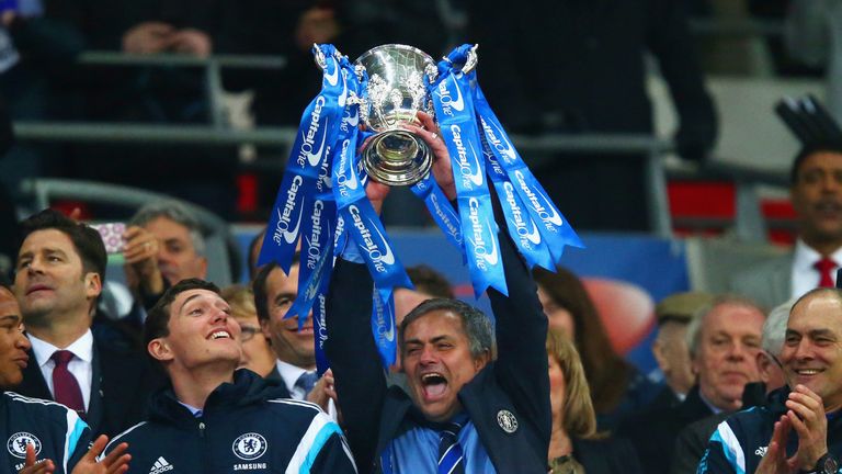Manager Jose Mourinho of Chelsea lifts the trophy during the Capital One Cup Final match between Chelsea and Tottenham Hotspur