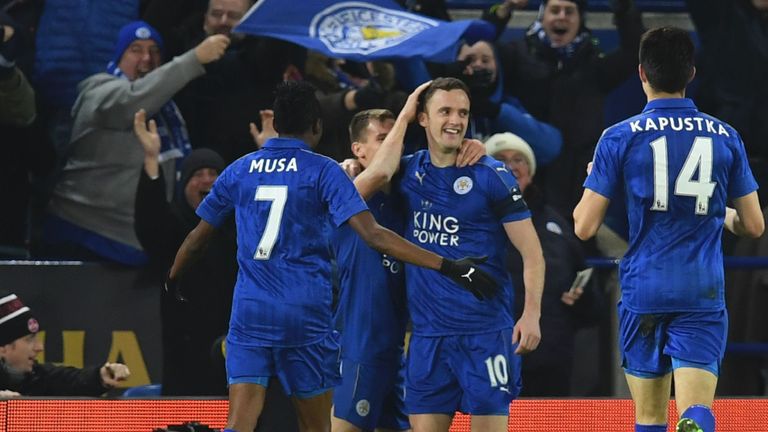Leicester City's Welsh midfielder Andy King (2R) celebrates 