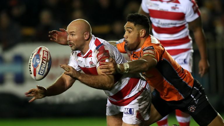 Leigh Centurions' Glenn Stewart (left) is tackled by Castleford Tigers' Jesse Sene-Lefao during the Super League match at the Mend-A-Hose Jungle, Castlefor