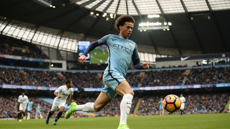 Manchester City's German midfielder Leroy Sane runs with the ball during the English Premier League football match between Manchester City and Swansea City
