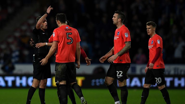 HUDDERSFIELD, ENGLAND - FEBRUARY 02:  Lewis Dunk of Brighton is sent off by referee James Linington during the Sky Bet Championship match between Huddersfi