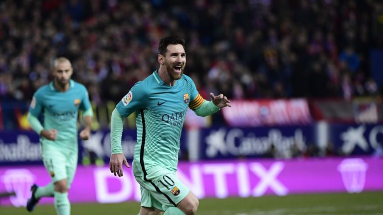 Lionel Messi celebrates Barcelona's second against Atleti