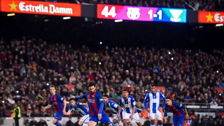 Barcelona's Argentinian forward Lionel Messi shoots a penalty kick to score a goal  during the Spanish league football match FC Barcelona vs CD Leganes at 