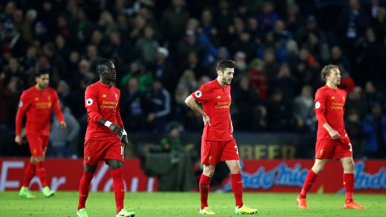 Liverpool players look dejected after their defeat at Leicester