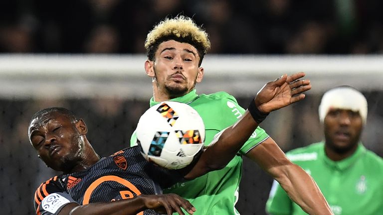 Abdul Waris Majeed and Kevin Malcuit (R) vie for possession during a French Ligue 1 match