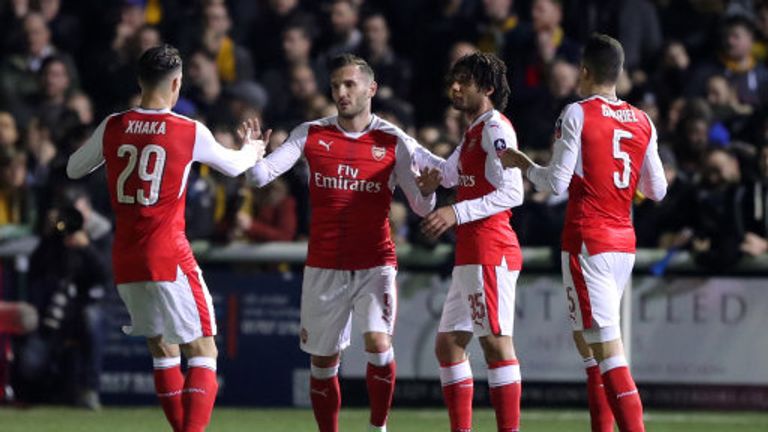 Lucas Perez is congratulated by team-mates after scoring Arsenal's opener against Sutton