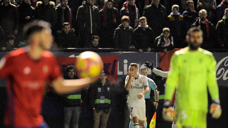 Lucas Vazquez (centre) celebrates after scoring Real's third goal 