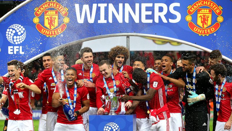 Manchester United celebrate winning the EFL Cup with a 3-2 win over Southampton
