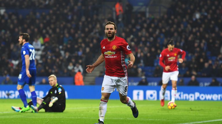 LEICESTER, ENGLAND - FEBRUARY 05:  Juan Mata of Manchester United celebrates as he scores their third goal during the Premier League match between Leiceste