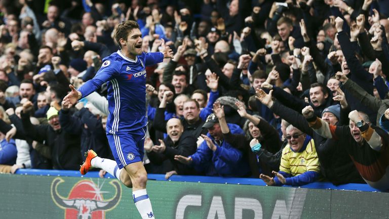 Marcos Alonso celebrates after scoring the opening goal of the game