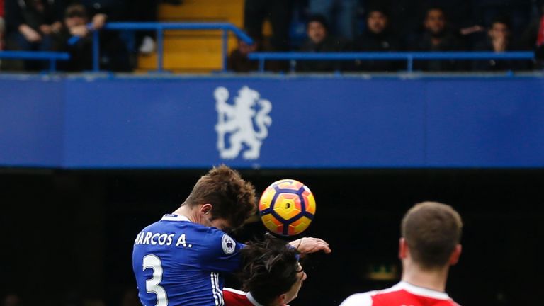 Marcos Alonso rises above Hector Bellerin to head Chelsea into a 1-0 lead