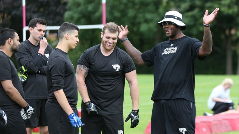 Marcus Stroud coaches the defensive lineman at last year's training camp