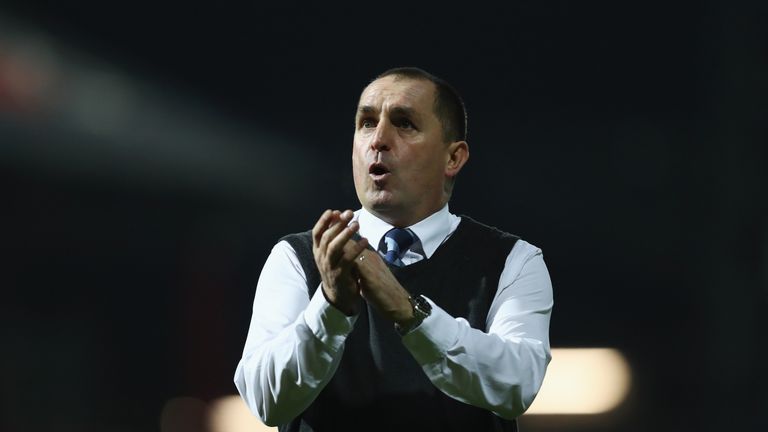 Martin Allen applauds supporters after FA Cup game between Brentford and Eastleigh