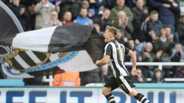 Newcastle United's Matt Ritchie celebrates after scoring his side's first goal during the Sky Bet Championship match at St James' Park, Newcastle.