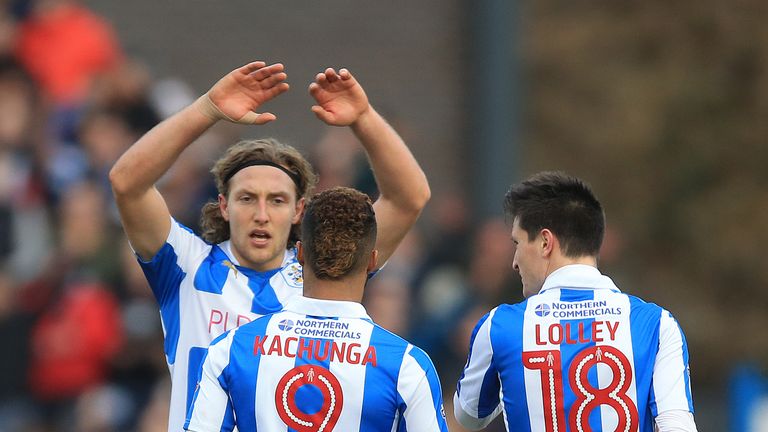 Huddersfield Town's Michael Hefele (facing) celebrates scoring his side's second goal of the game with Elias Kachunga during the Sky Bet Championship match