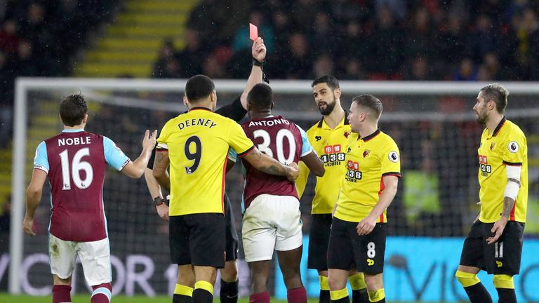 WATFORD, ENGLAND - FEBRUARY 25: Michail Antonio of West Ham United is shown a red card during the Premier League match between Watford and West Ham United 