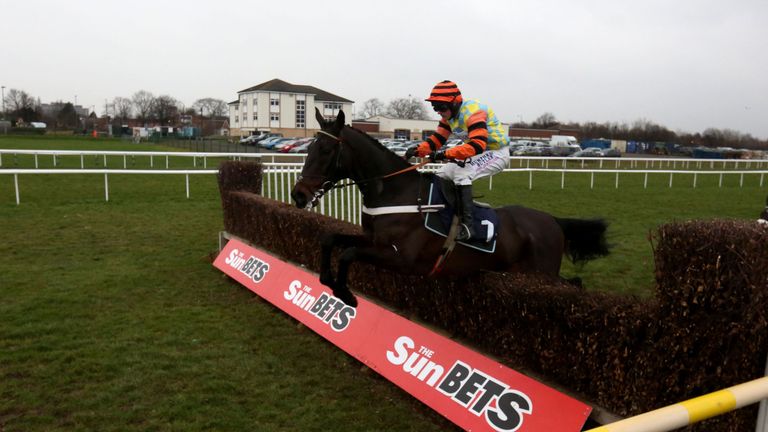 Might Bite ridden by Nico de Boinville on the first lap during The Soar Enterprises Online Ltd Novices' Steeple Chase at Doncaster Racecourse. PRESS ASSOCI