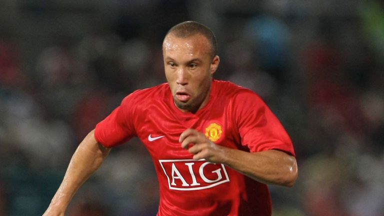 MACAU, CHINA - JULY 23:  Mikael Silvestre of Manchester United in action during a pre-season friendly match against Shenzhen FC during the club's Asia Tour