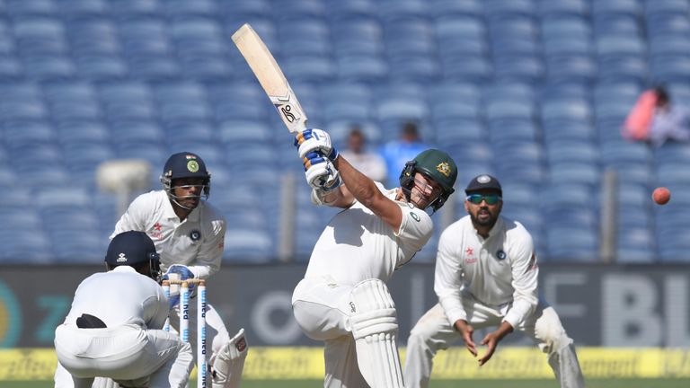 Mitchell Starc hit a counter-attacking half-century on day one in Pune (Credit: AFP)