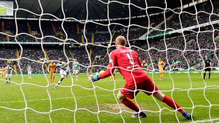Moussa Dembele opens the scoring for Celtic with a penalty against Motherwell