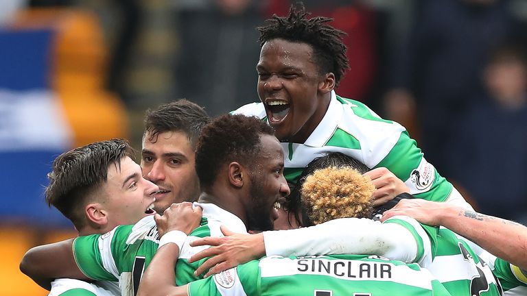 PERTH, SCOTLAND - FEBRUARY 05:  Moussa Dembele of Celtic is congratulated by team mates after he scores his third goal during the Ladbrokes Scottish Premie