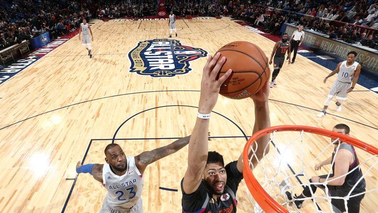 Anthony Davis #23 of the Western Conference All-Stars dunks 