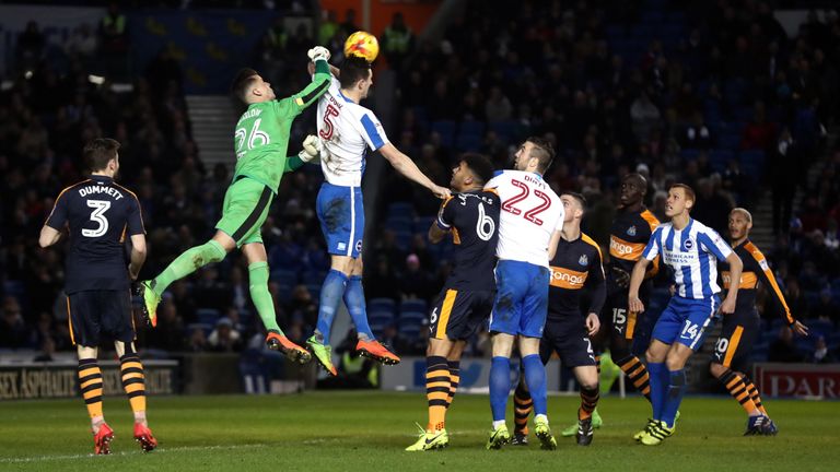 Newcastle United goalkeeper Karl Darlow punches clear during the Sky Bet Championship match at the AMEX Stadium, Brighton