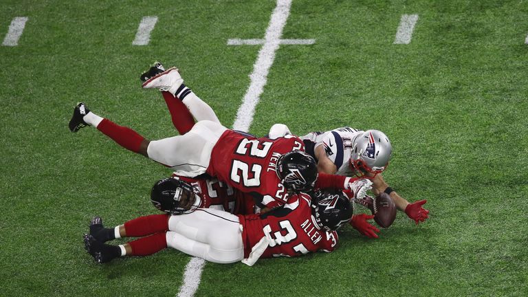 Julian Edelman #11 of the New England Patriots makes a 23 yard catch in the fourth quarter