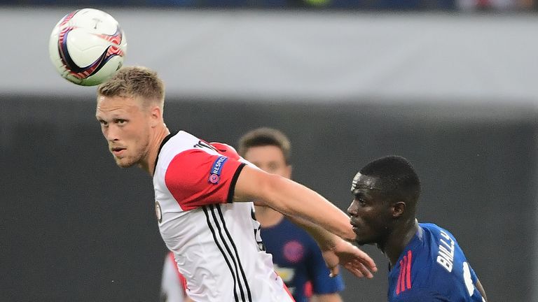 Feyenoord's Nicolai Jorgensen (L) heads a ball next to Manchester United's Eric Bailly during the UEFA Europa League football match between Feyenoord Rotte