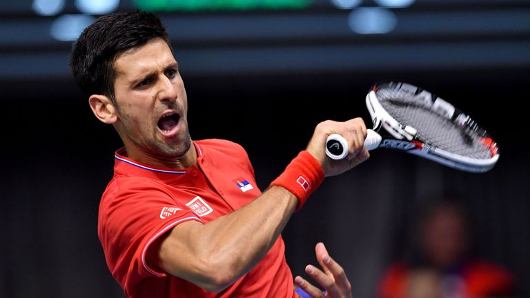 Serbia's Novak Djokovic returns the ball to Russia's Daniil Medvedev during the Davis Cup World Group first round singles tennis match between Serbia and R