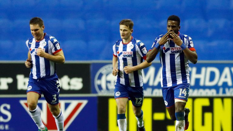 Wigan Athletic's Omar Bogle (right) celebrates after opening his account