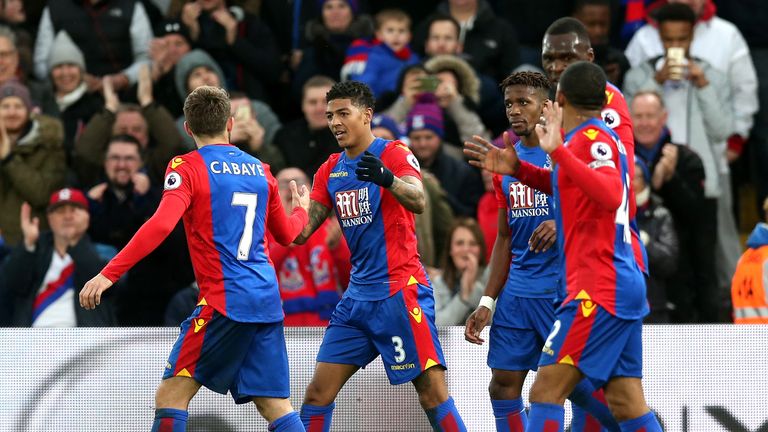 LONDON, ENGLAND - FEBRUARY 25:  Patrick van Aanholt of Crystal Palace (C) celebrates scoring his sides first goal with his Crystal Palace team mates during