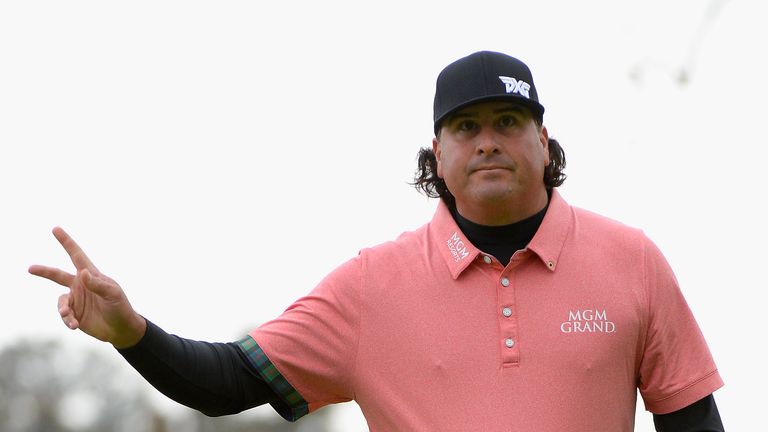 PACIFIC PALISADES, CA - FEBRUARY 18: Pat Perez reacts to his birdie on the 18th hole during a continuation of the second round at the Genesis Open at Rivie