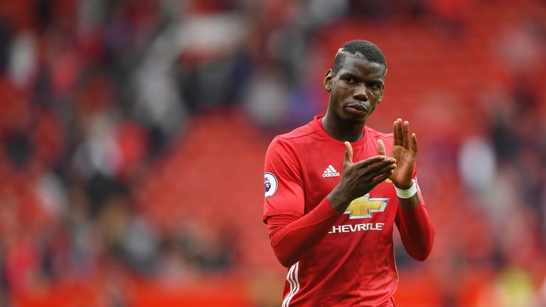 MANCHESTER, ENGLAND - SEPTEMBER 24:  Paul Pogba of Manchester United shows his appreciation for the fans after the final whistleduring the Premier League m