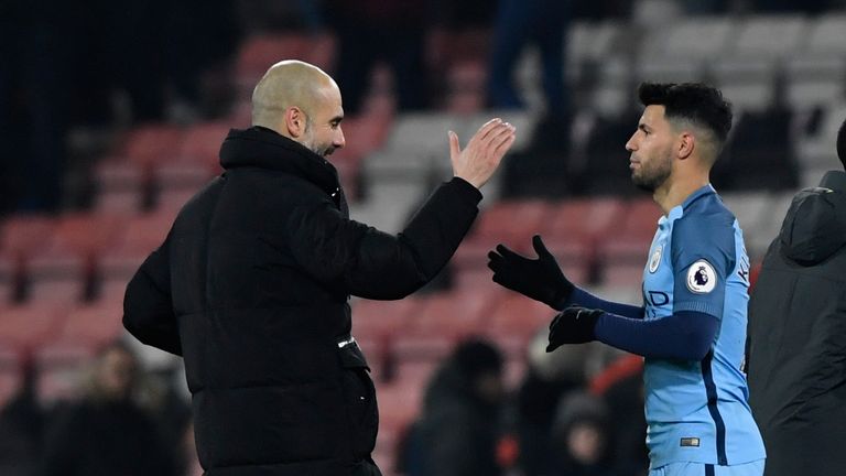 BOURNEMOUTH, ENGLAND - FEBRUARY 13:  Pep Guardiola, manager of Manchester City shakes hands with Sergio Aguero of Manchester City after the Premier League 