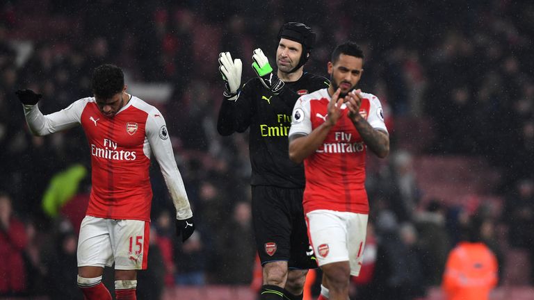 LONDON, ENGLAND - JANUARY 31:  Theo Walcott, Alex Oxlade-Chamberlain and Petr Cech of Arsenal applaud after their 1-2 defeat in the Premier League match be