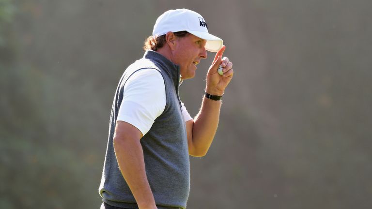 PACIFIC PALISADES, CA - FEBRUARY 16:  Phil Mickelson reacts to his birdie putt on the 12th green during the first round at the Genesis Open at Riviera Coun